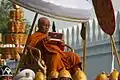 a senior monk, Chun, was provided with a glòt umbrella as he recited the Higher Laws leading the funeral procession of Princess Galyani Vadhana towards, 15 November 2008.